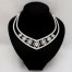 Collier plastron fleur blanc pailleté CO7009