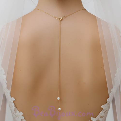 Bijou de dos perles blanches et chaine dorée