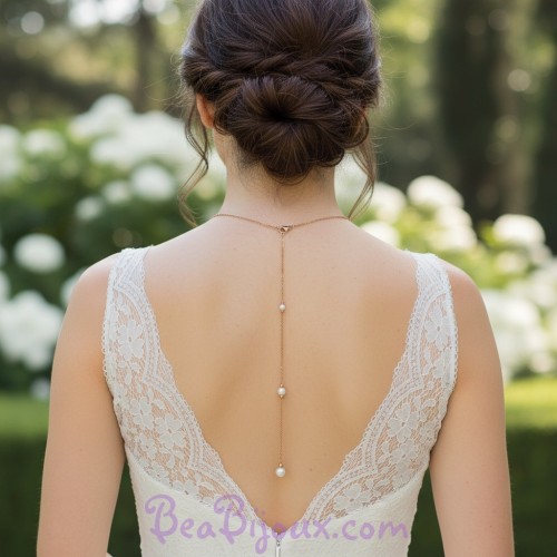 Bijou de dos doré perles nacrées et dorées
