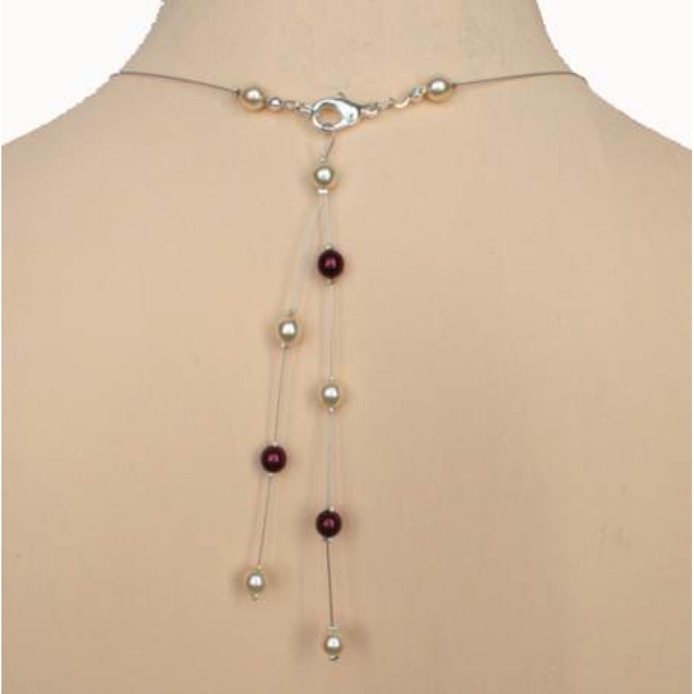 Bijou pendentif de dos ivoire et bordeaux Bijou pendentif de dos ivoire et bordeaux