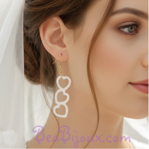 Boucles d'oreilles coeurs blanc