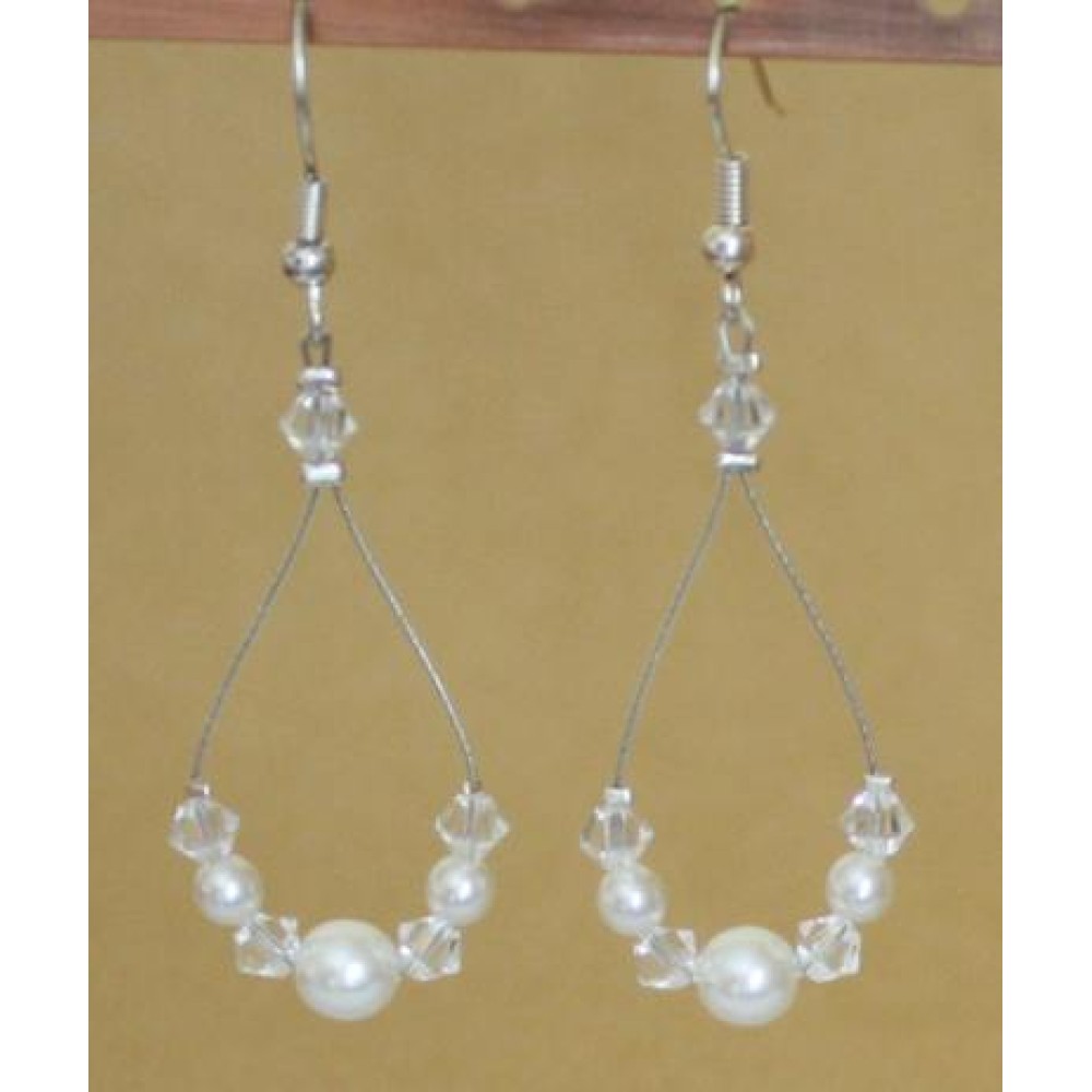 Boucles d'oreilles cristal et blanc Boucles d'oreilles cristal et blanc
