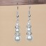 Boucles d'oreilles blanc et strass BO1250A Boucles d'oreilles blanc et strass BO1250A