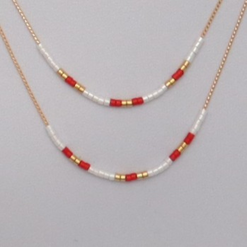 Collier double rang or blanc et rouge Collier double rang or blanc et rouge